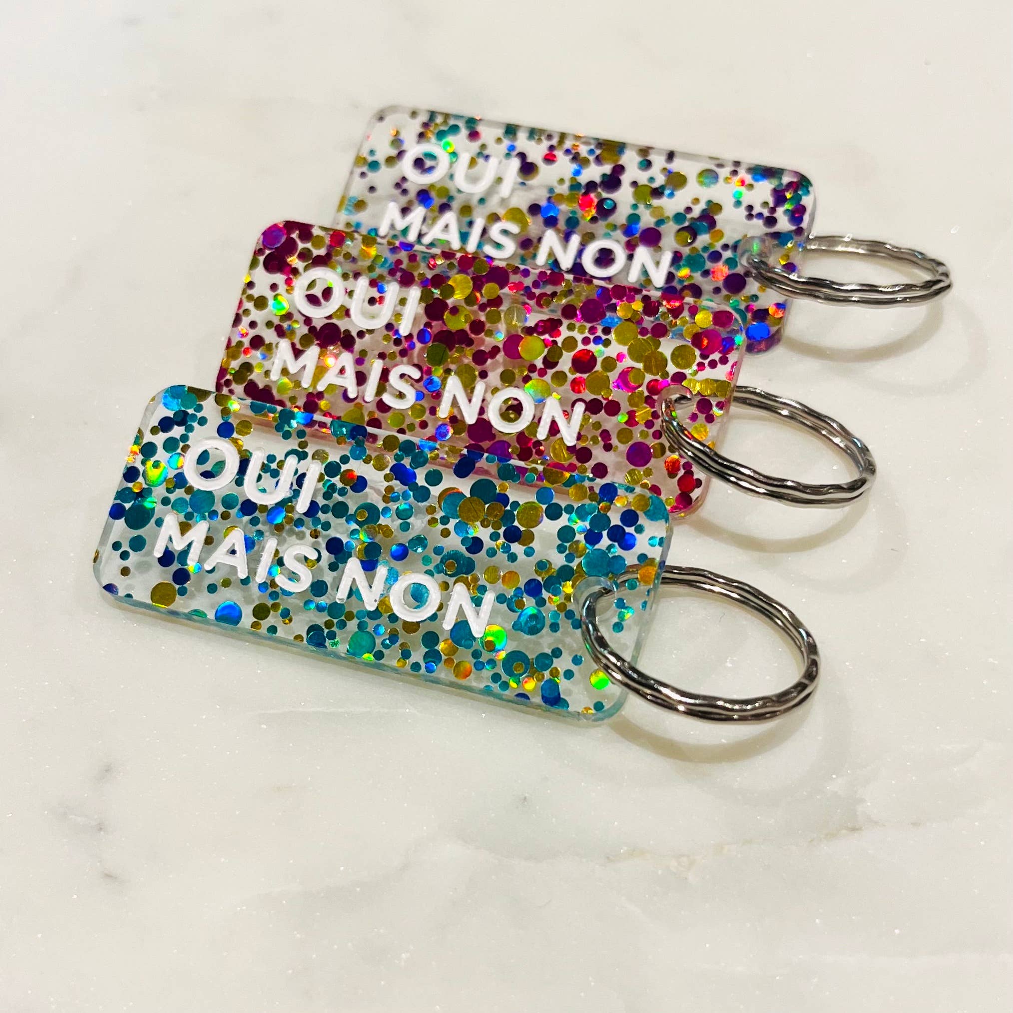 OUI MAIS NON Porte-clés à paillettes Plus de Love: Bleu / Or / Vert