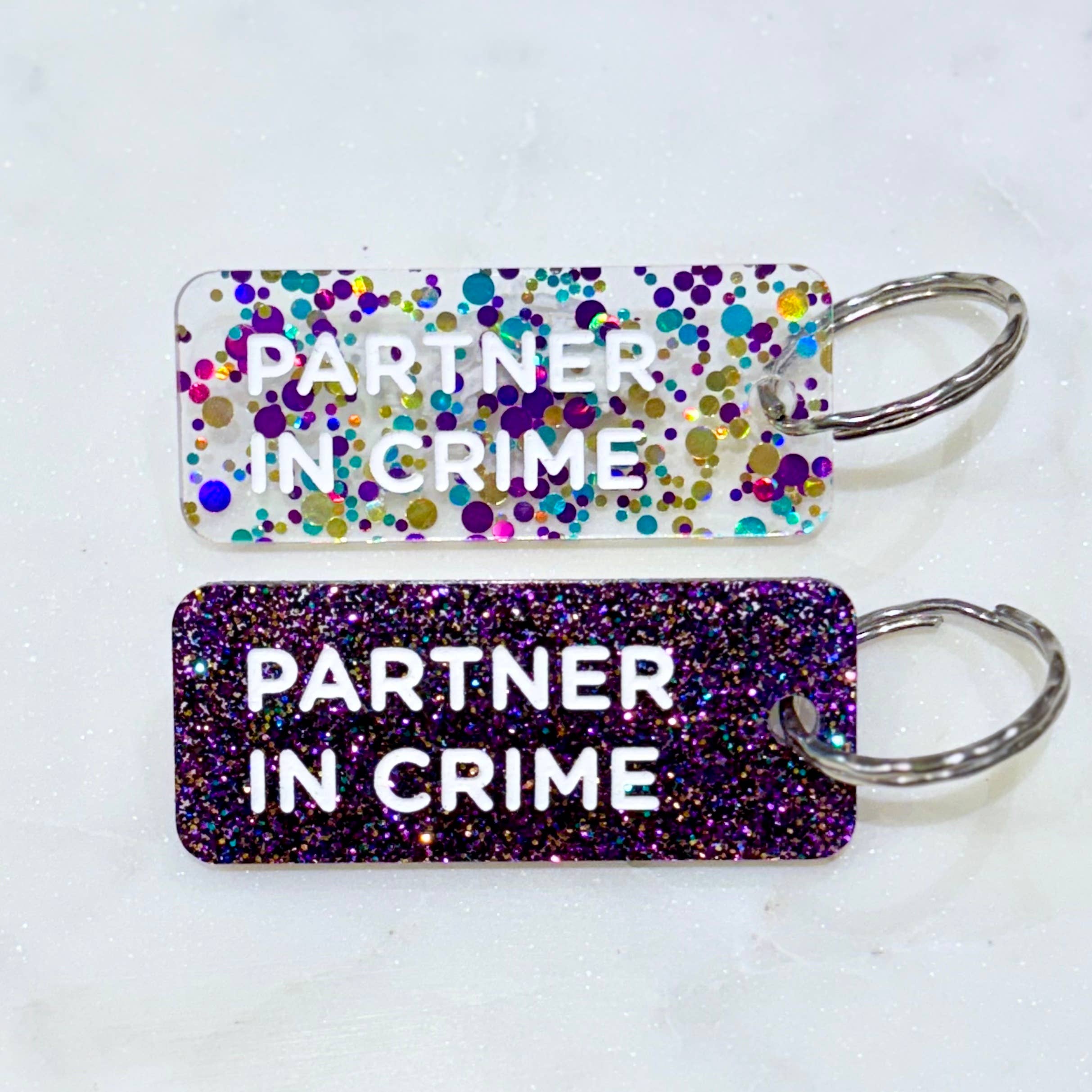 PARTNER IN CRIME Porte-clés à paillettes Plus de Love: Noir