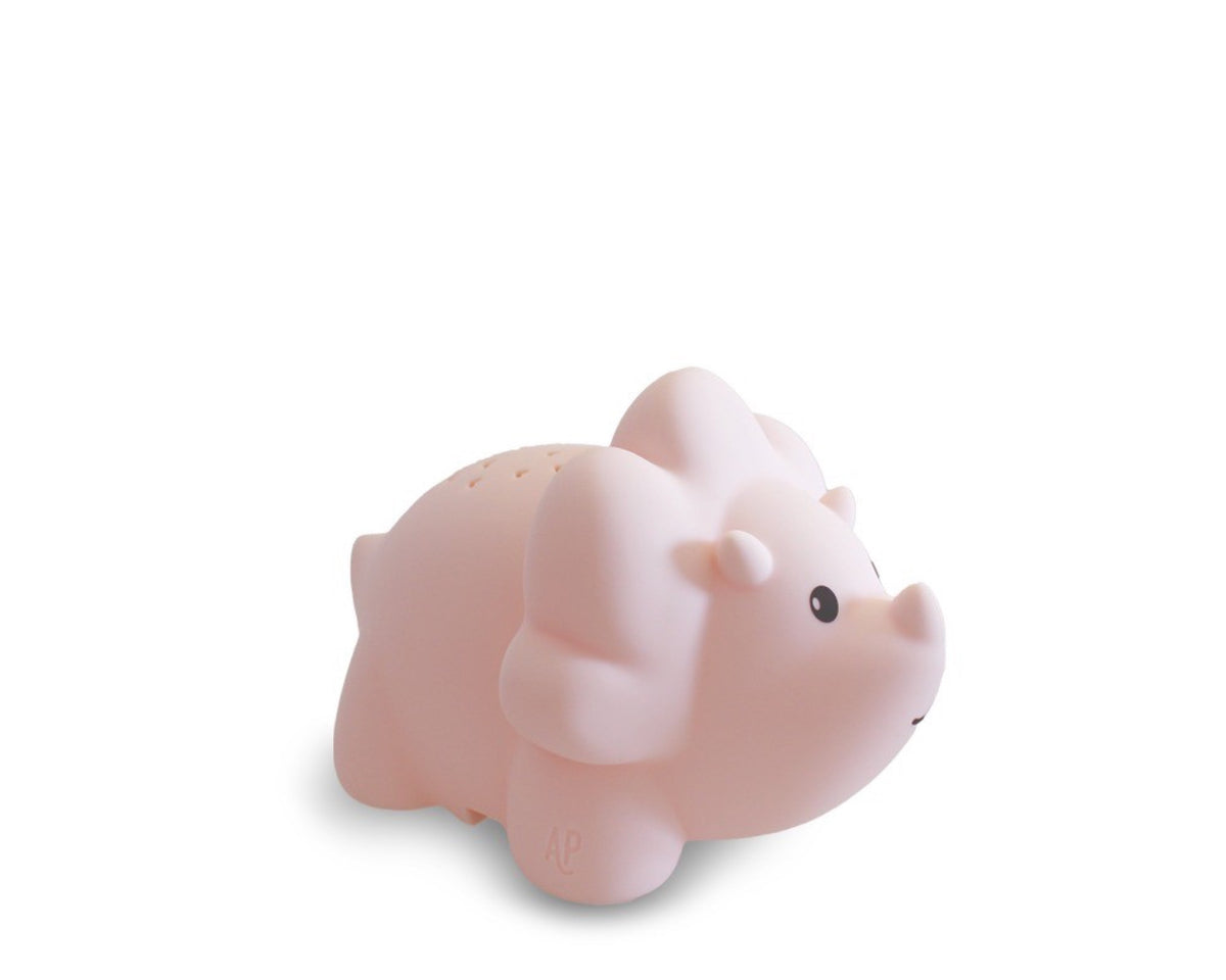 Veilleuse en silicone rechargeable — AP Junior — Juliette dino projecteur rose — packshot | Appart 17 Bruxelles