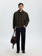SLMCODY Polo en maille de laine, coupe décontractée — Selected Homme — Turkish Coffee — porté, sous une veste 5 | Appart 17 Bruxelles
