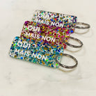 OUI MAIS NON Porte-clés à paillettes Plus de Love: Bleu / Or / Vert