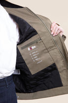 Flotte CARNOT Veste imperméable à brandebourgs — Flotte — Kaki — détail de la doublure 7 | Appart 17 Bruxelles