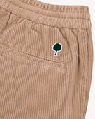 DREUILLE Pantalon en velours côtelé, taille élastique — FAGUO — Beige foncé — gros plan broderie 7 | Appart 17 Bruxelles
