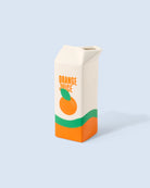Fluid Market Vase Orange Juice brique de jus en céramique — Fluid Market — Blanc & orange — packshot | Appart 17 Bruxelles