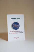 Pin's « Imbécile heureux » — Félicie Aussi — Bleu — photo produit | Appart 17 Bruxelles