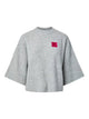 PCNIKO Pull court manches courtes à écusson brodé — Pieces — Light Grey Melange — packshot | Appart 17 Bruxelles