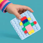 Silipop Pocket, jeu de mosaïque en silicone — SuperPetit — Bleu clair — packshot | Appart 17 Bruxelles