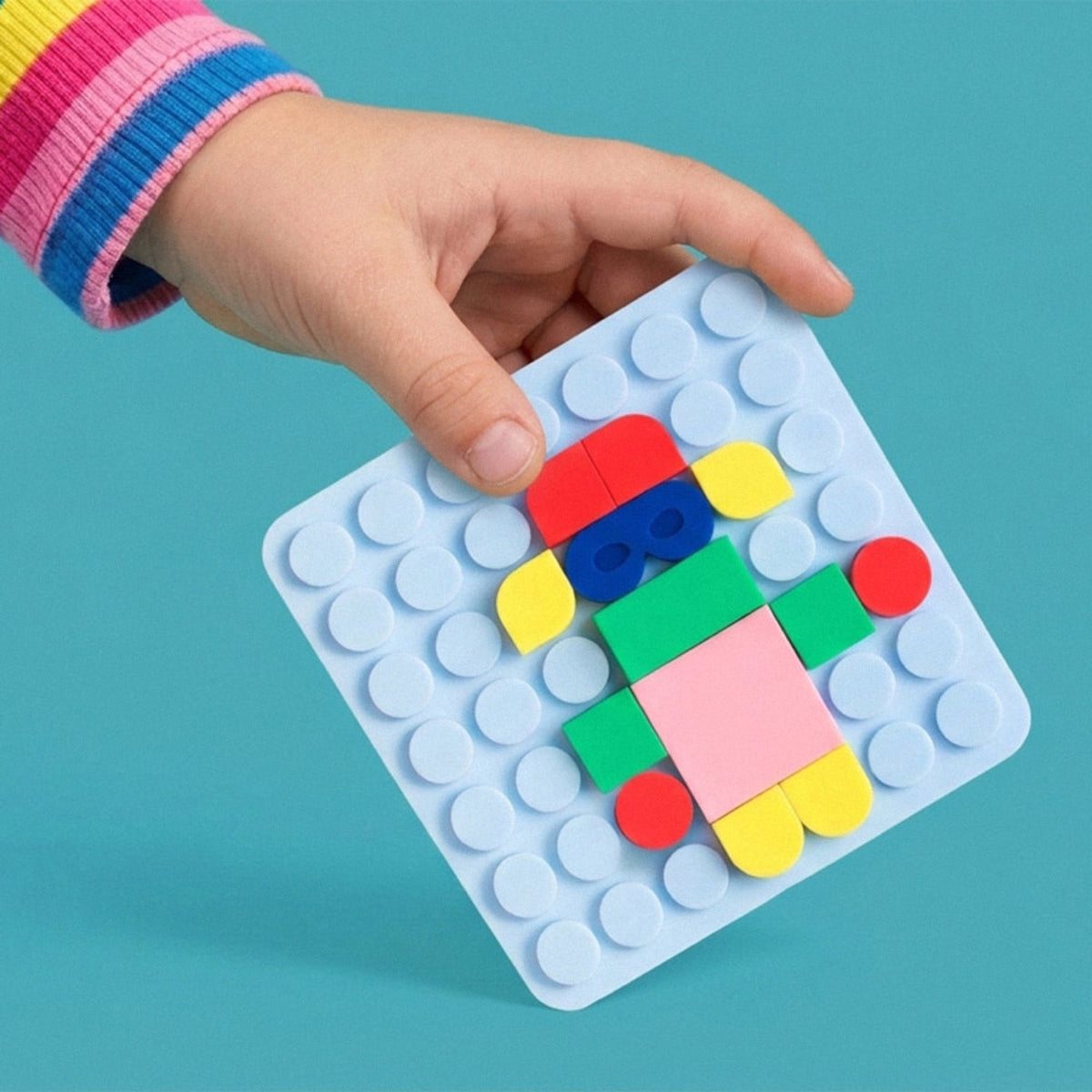 Silipop Pocket, jeu de mosaïque en silicone — SuperPetit — Bleu clair — packshot | Appart 17 Bruxelles