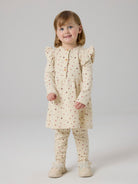 NMFHAYLA Robe sweat à fleurs et volants fille — name it — Almond Milk — porté | Appart 17 Bruxelles