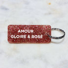 AMOUR GLOIRE & ROSÉ Porte-clés à paillettes Plus de Love: Rose champagne