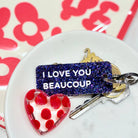 I LOVE YOU BEAUCOUP Porte-clés à paillettes Plus de Love: Fuchsia / Or — Appart 17 Bruxelles