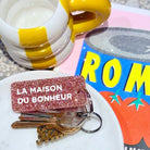 LA MAISON DU BONHEUR Porte-clés à paillettes Plus de Love: Or