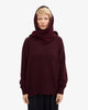 Colorful Standard Merino Wool Scarf Écharpe laine mérinos recyclée — Colorful Standard — Oxblood Red — porté, vue de face | Appart 17 Bruxelles