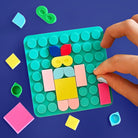 Silipop Pocket, jeu de mosaïque en silicone — SuperPetit — Turquoise — packshot | Appart 17 Bruxelles