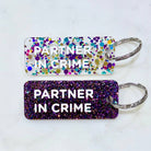 PARTNER IN CRIME Porte-clés à paillettes Plus de Love: Noir