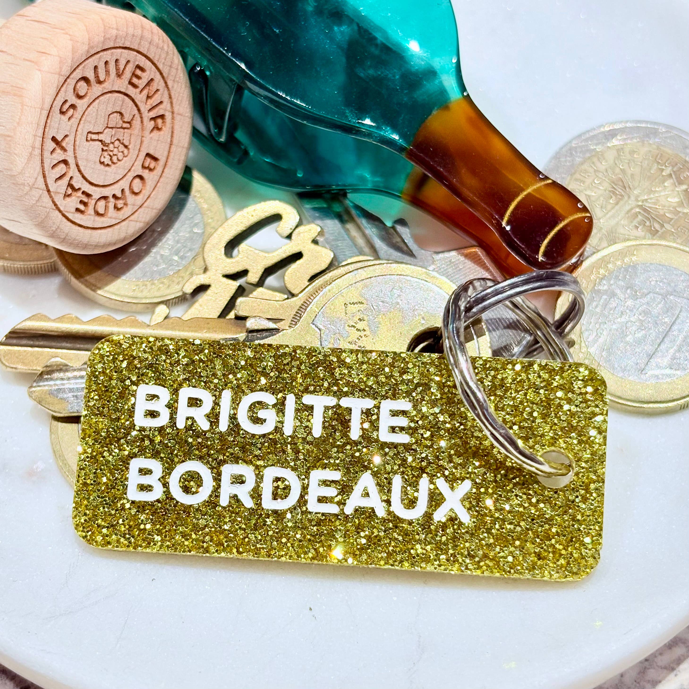 BRIGITTE BORDEAUX Porte-clés à paillettes Plus de Love: Or