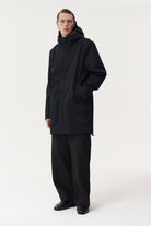 TERROR WEATHER Parka imperméable isolée MEIDA 150 g — Welter Shelter — Black — porté | Appart 17 Bruxelles