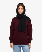 Colorful Standard Merino Wool Scarf Écharpe laine mérinos recyclée — Colorful Standard — Deep Black — porté, vue de face | Appart 17 Bruxelles