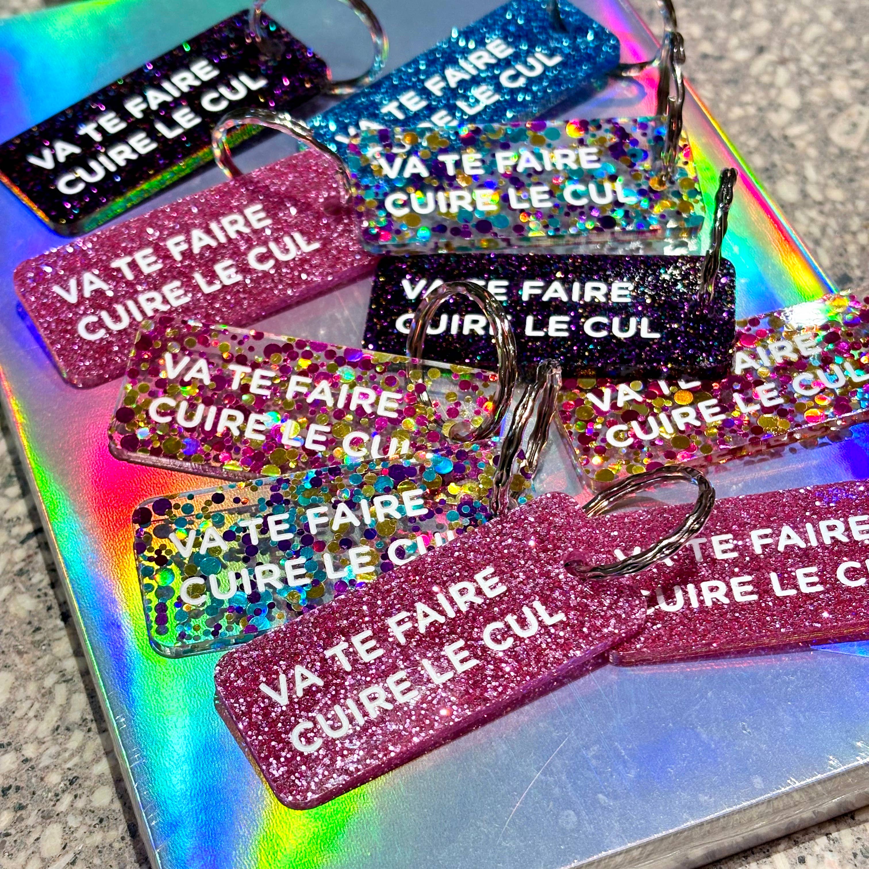 VA TE FAIRE CUIRE LE CUL Porte-clé à paillettes Plus de Love: Violet — Appart 17 Bruxelles