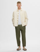 SLH180 RELAXED CROPPED MAGNUS SUN PANT — SELECTED HOMME BLACK — zoom matière | Appart 17