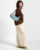 POLKA Sac bandoulière matelassé en polyester recyclé — Wouf — Polka — porté | Appart 17 Bruxelles