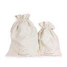 Doudou Ange Lapin avec hochet 20 cm — Trousselier — Rose poudré — sacs d'emballage réutilisables en coton siglés Trousselier 3 | Appart 17 Bruxelles