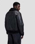 AVIATOR Blouson aviateur homme effet cuir, col chemise en sherpa — Lee — Black — porté, de dos (trois-quarts) 3 | Appart 17 Bruxelles