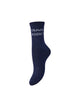 PCSEBBY Chaussettes longues pailletées à slogan — Pieces — Maritime Blue TRAVEL ADDICT — packshot | Appart 17 Bruxelles